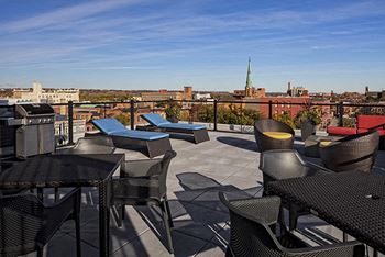 Sky deck with gas fire pit and grilling station